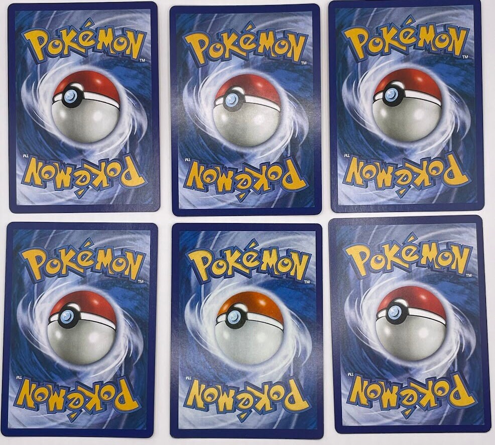 Magneton Reprint Bundle Lot of 8 - Base Set 2, Team Rocket, Base Set First Edition, Gym Heroes, Skyridge and Neo Revelation