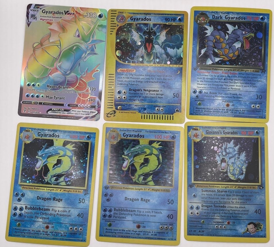 Gyarados Reprint Bundle Lot of 12 - Base Set 2, Base Set First Edition, Team Rocket, Gym Challenge, Neo Revelation, Skyridge-Evolving Skies
