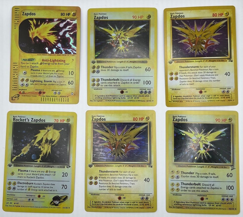 Zapdos Reprint Bundle Lot of 6 - Fossil, Base Set 2, Base Set First Edition, Aquapolis and Team Rocket