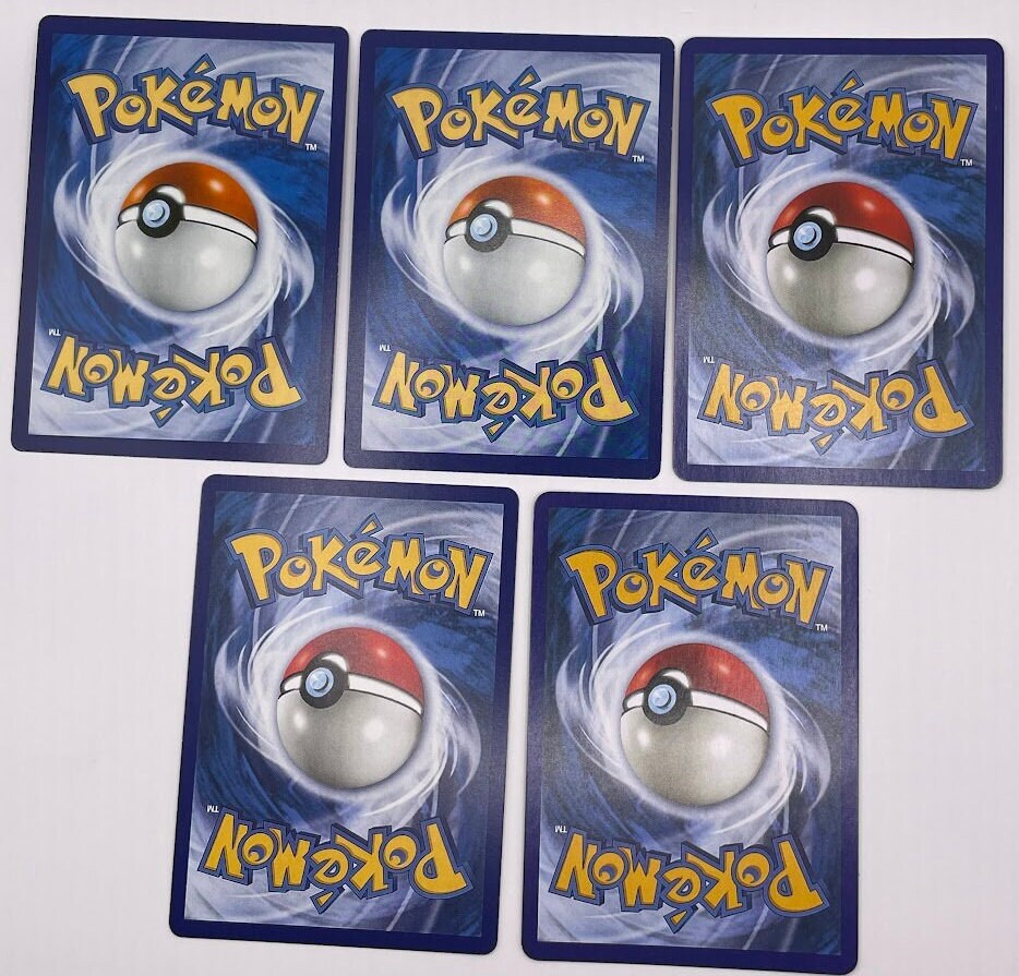 Gyarados Reprint Bundle Lot of 12 - Base Set 2, Base Set First Edition, Team Rocket, Gym Challenge, Neo Revelation, Skyridge-Evolving Skies