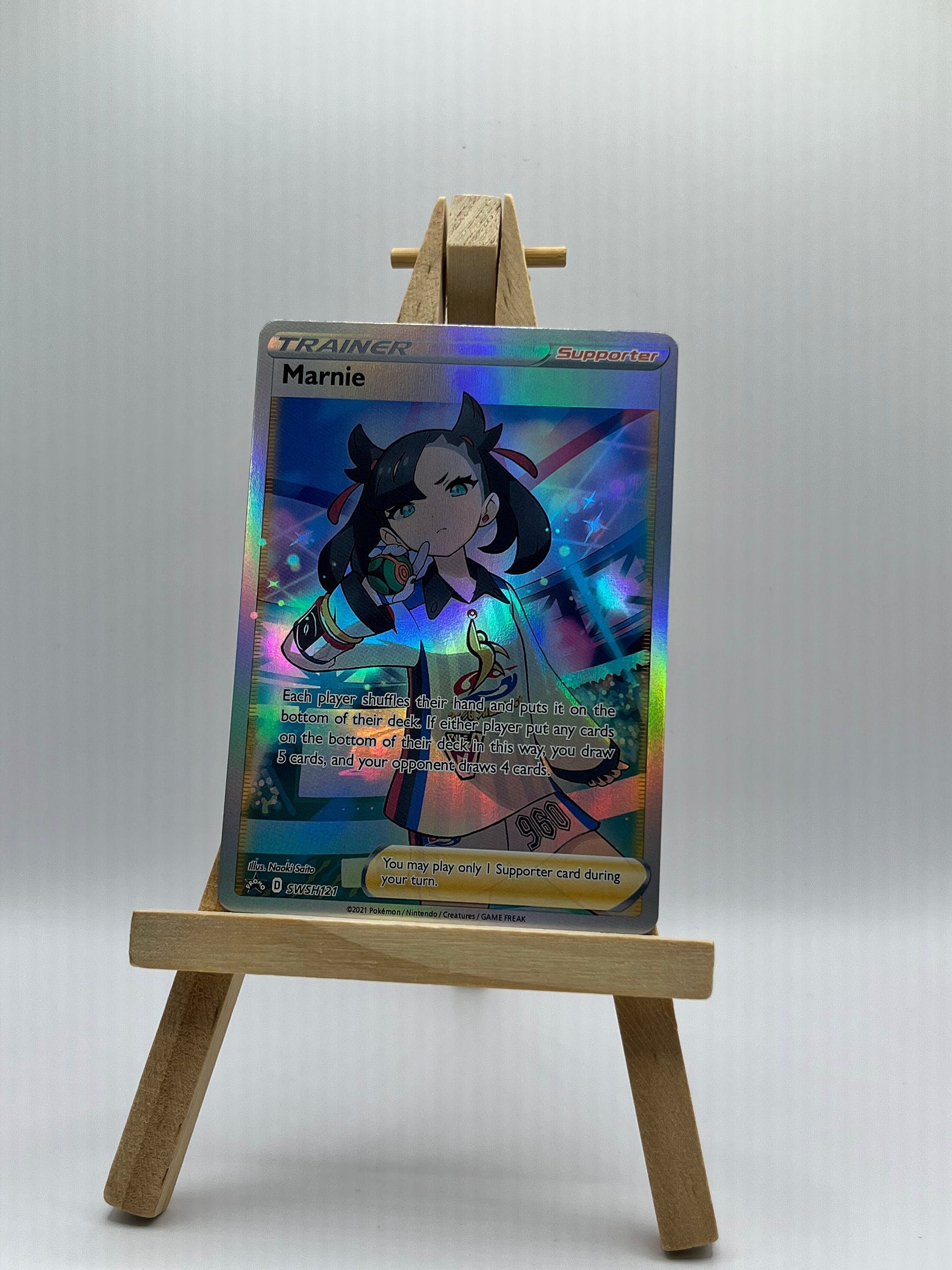 Marnie - SWSH121 - SWSH: Sword & Shield Promo Cards (SWSD)