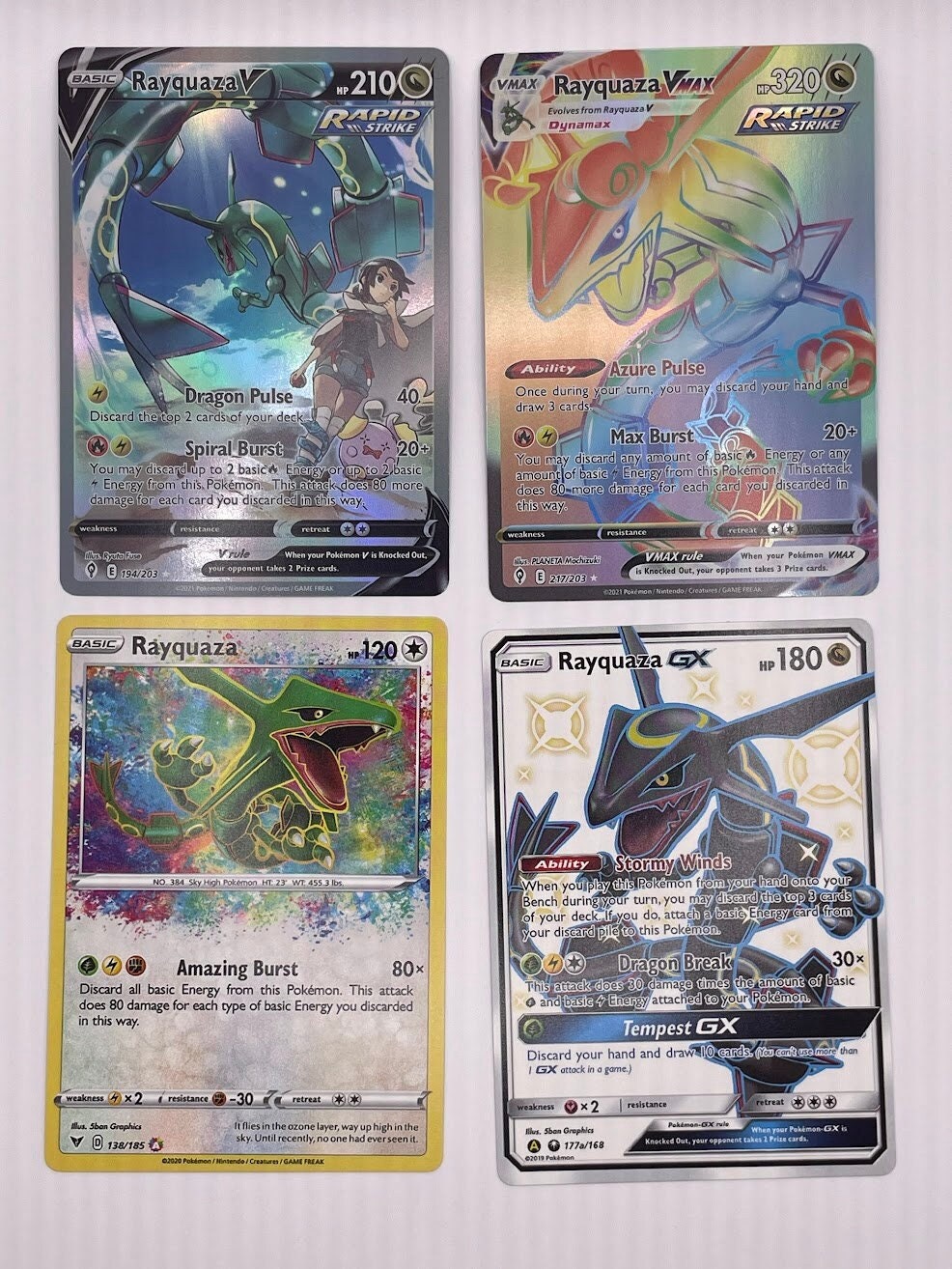 Rayquaza Reprint Bundle Lot of 4 - Sword and Shield Evolving Skies, Vivid Voltage and Hidden Fates