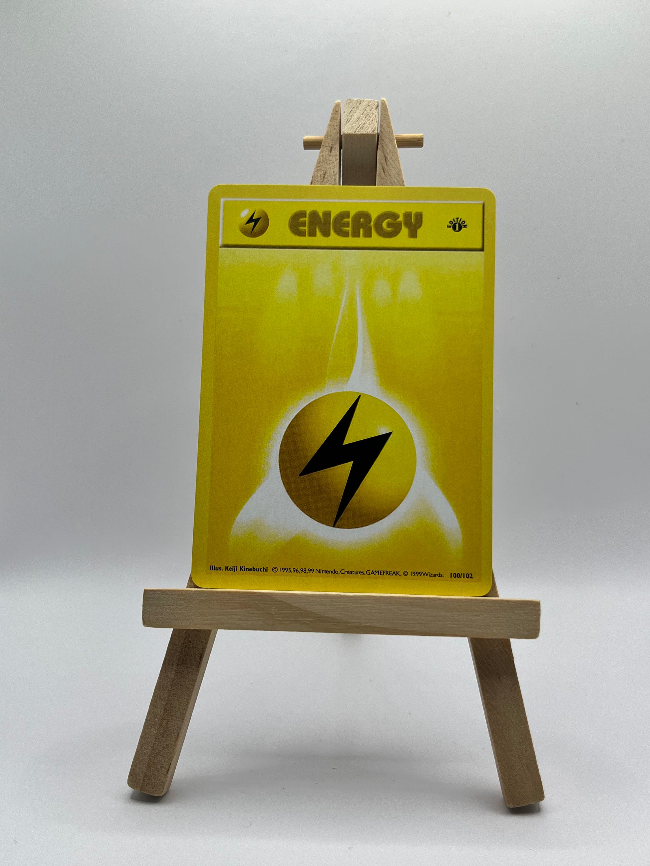 Lightning Energy · Base First Edition #100(Shadowless)